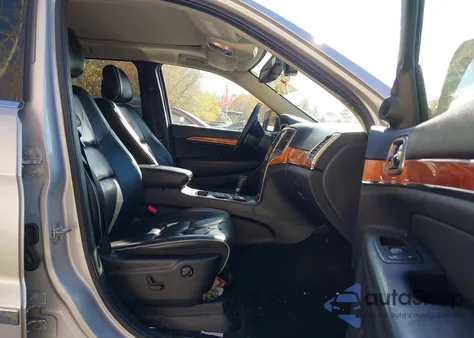 2012 Jeep Grand Cherokee Overland z USA, uszkodzony, nr VIN 1C4RJECG3CC258140